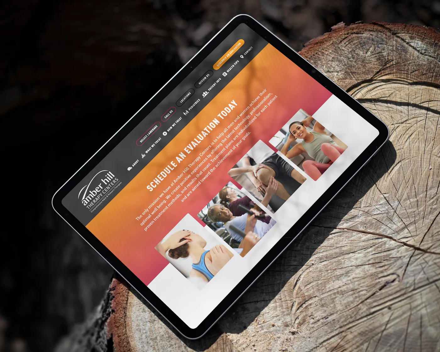 A tablet resting on a tree stump, displaying the Amber Hill Therapy Centers website. The page invites users to schedule an evaluation and features several photos of people engaged in physical therapy exercises. The top navigation bar includes links for scheduling, locations, and services.